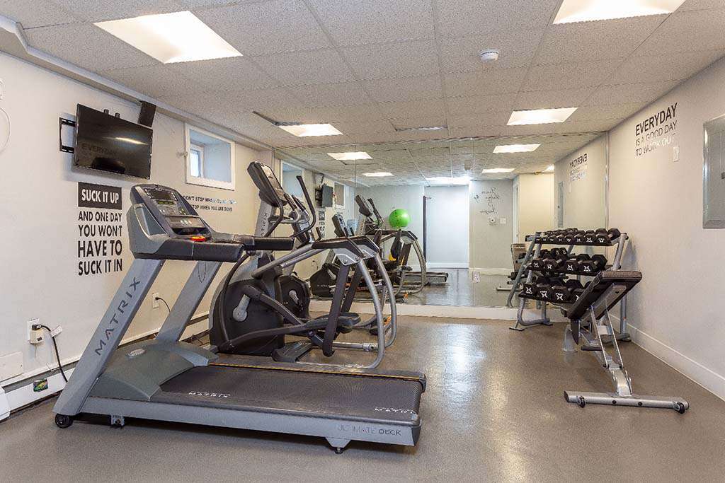 Fitness center with exercise equipment at Mt Airy Place apartments for rent in Philadelphia, PA