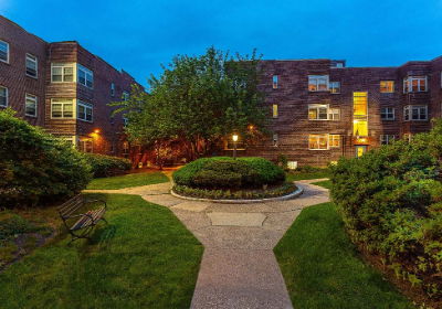 Beautifully landscaped courtyard at Sedgwick Gardens apartments for rent in Philadelphia, PA