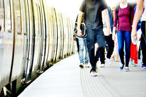 Stock photo of people leaving a train