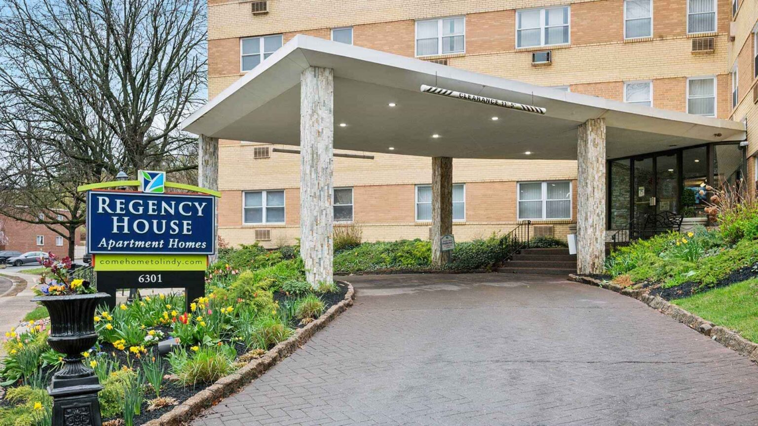 Regency House property exterior and sign