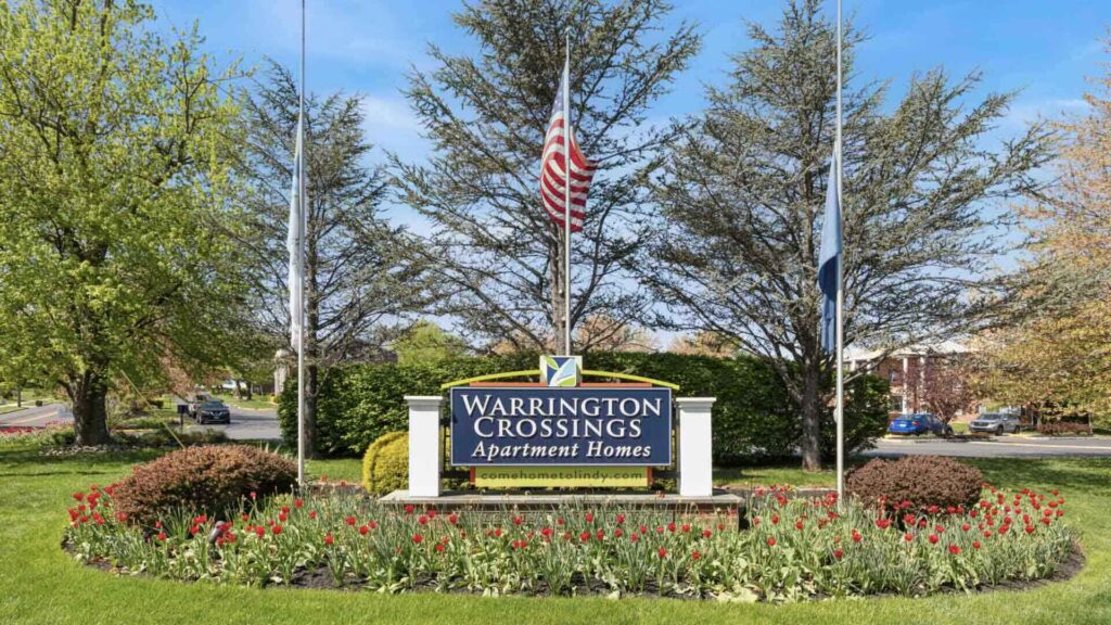 Exterior property sign at Warrington Crossings