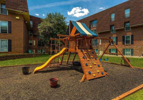Playground with a yellow slide near 7400 Roosevelt apartments for rent in Northeast Philadelphia