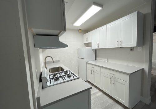 Academia Suites Modern Kitchen With Grey Flooring