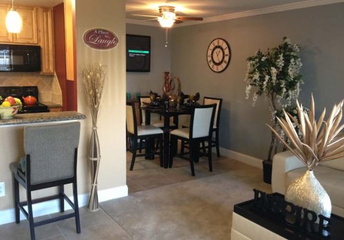 Decorated and fully furnished dining area and kitchen at Haverford Court apartments for rent