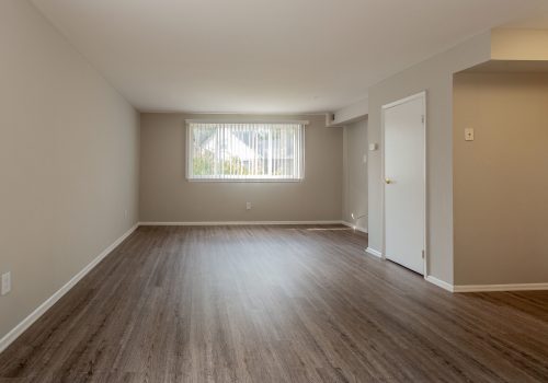 Living room with brown hardwood floors
