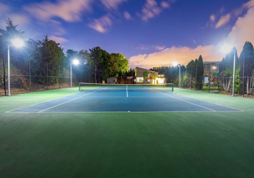 Night time exterior of tennis court