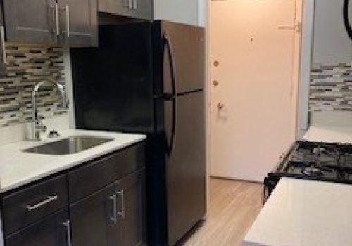 Upgraded kitchen with white countertop