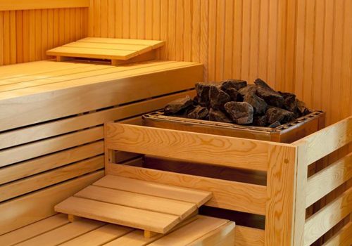 A hot sauna with lockers at Enclaves at Packer Park apartments for rent