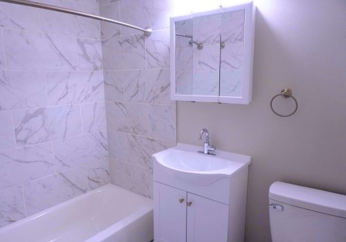 White modern bathroom with marbled shower
