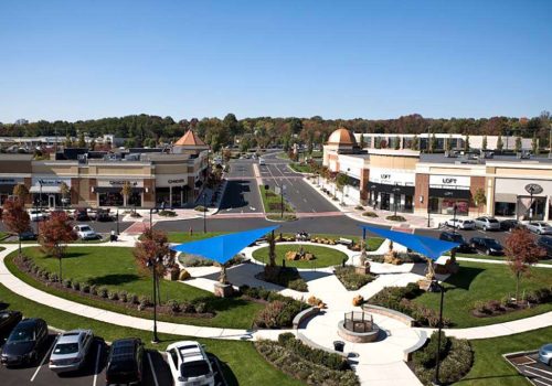 Exterior view of a shopping center nearby Warrington Crossings apartments for rent in Warrington, PA