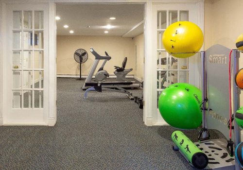 Fitness center with exercise equipment at Westgate Arms apartments for rent in Jeffersonville, PA